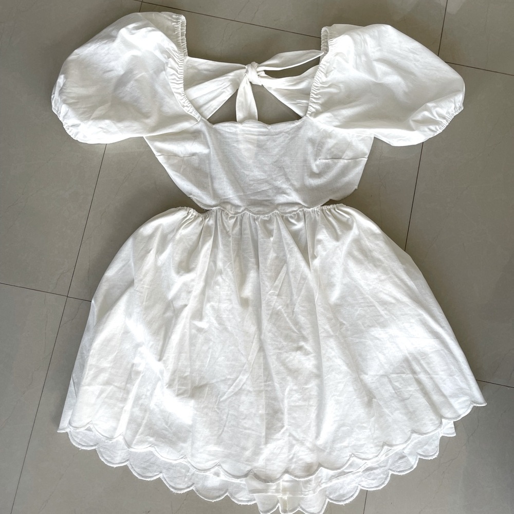 White puff sleeve dress with open back
